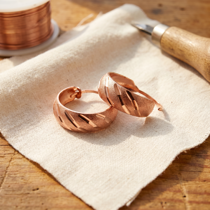 Boucles d’oreilles en cuivre gravé